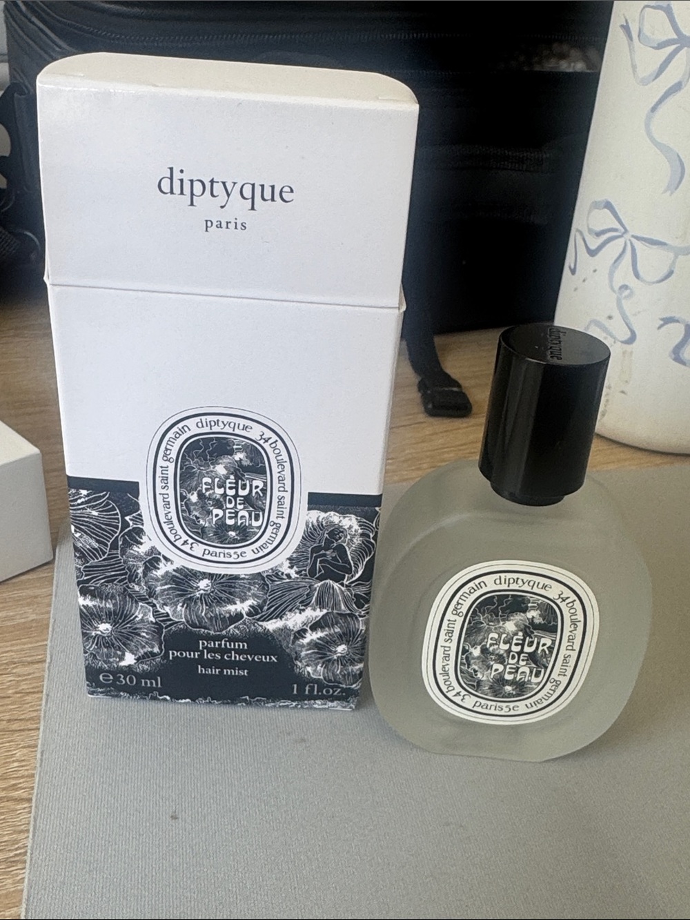 diptyque Hair Mist in White and Black Packaging